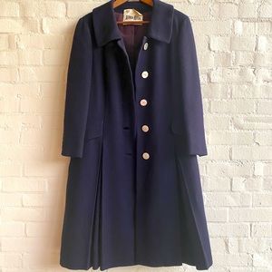 Vintage Neiman Marcus women’s navy trench coat. Fits a medium size.
